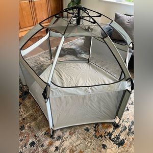 The California Beach Co Pop N Go premium outdoor baby playpen with self inflatin